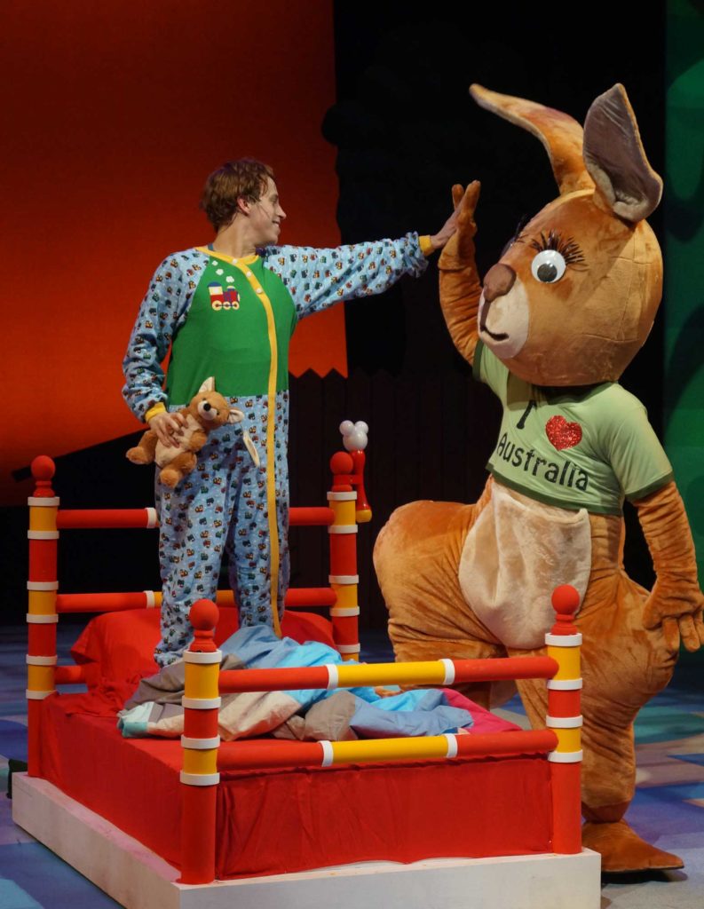 Photo of Alexander and a kangaroo.