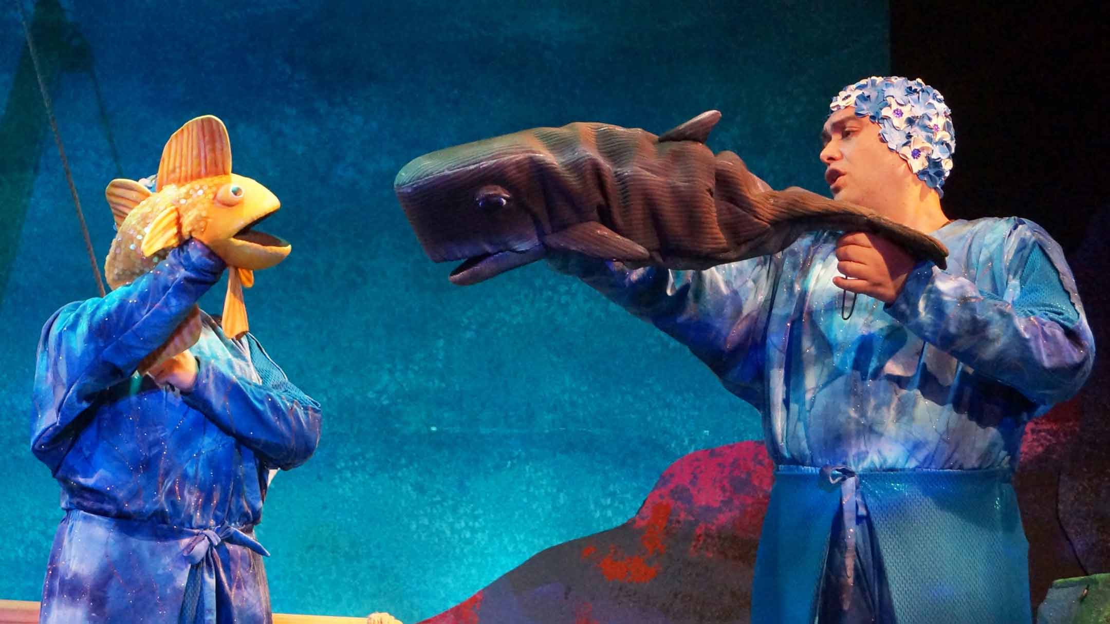 Fish and whale theater puppets with actors